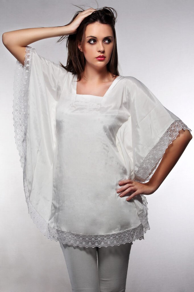 Professional lookbook photography Auckland of model in white lace tunic