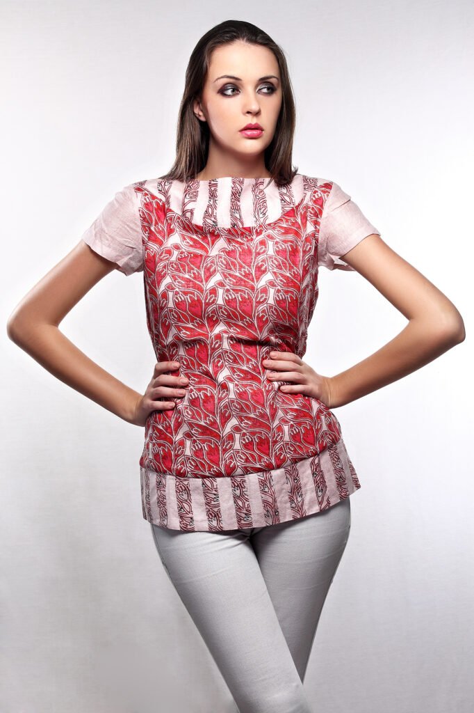 Studio apparel photography Auckland of model in red printed top