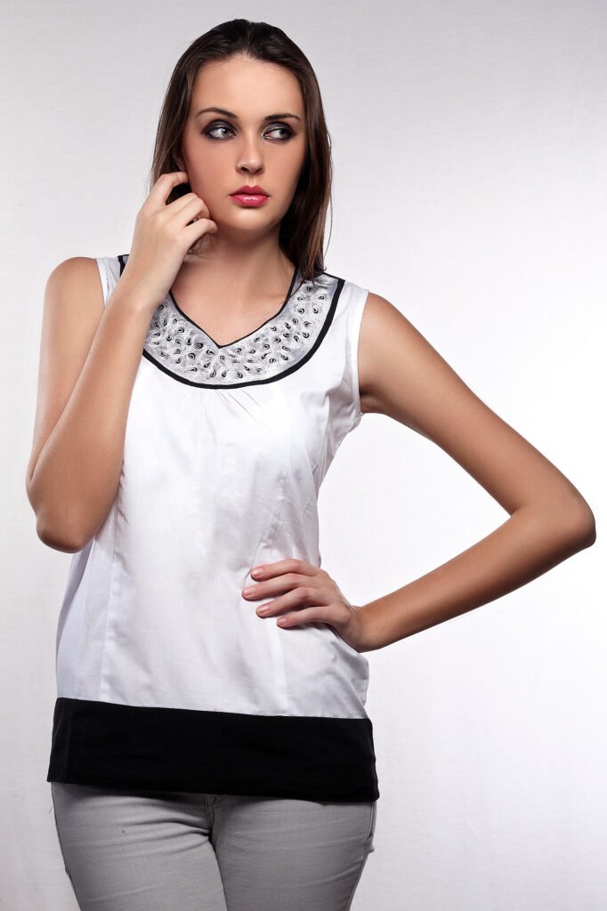 Studio clothing catalog Auckland of model in white sleeveless top