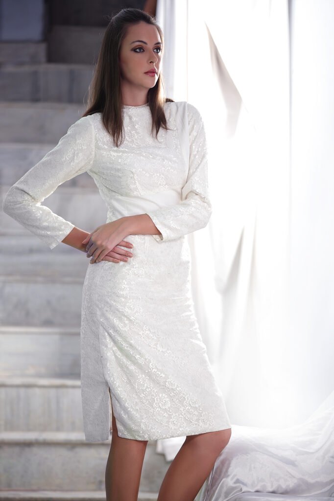 Fashion editorial shoot Auckland of model in white lace dress