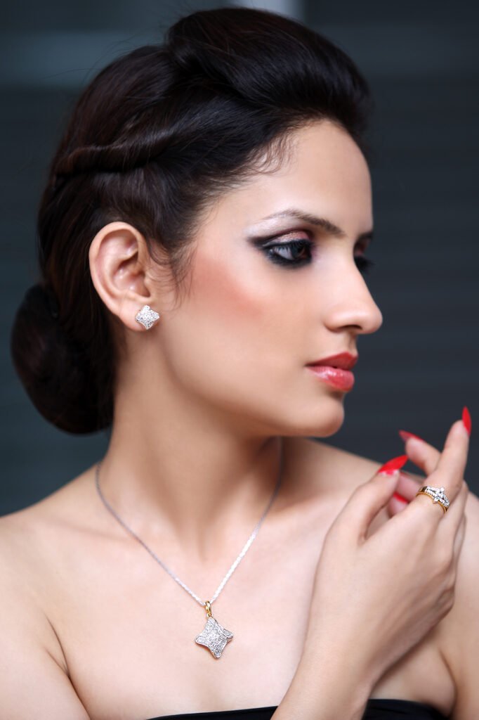Commercial jewellery photography Auckland of model wearing star diamond necklace and ring