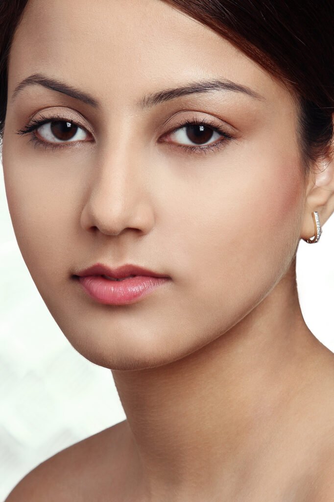 Close-up beauty portrait photography by an Auckland portrait photographer showcasing natural makeup and soft lighting