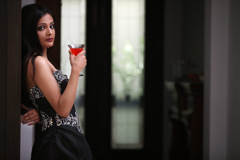 Cinematic glamour portrait photography of a woman in an evening gown by Auckland portrait photographer Jassa Studio