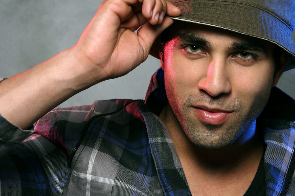 Dramatic male fashion portrait with studio lighting by Auckland portrait photographer Jassa