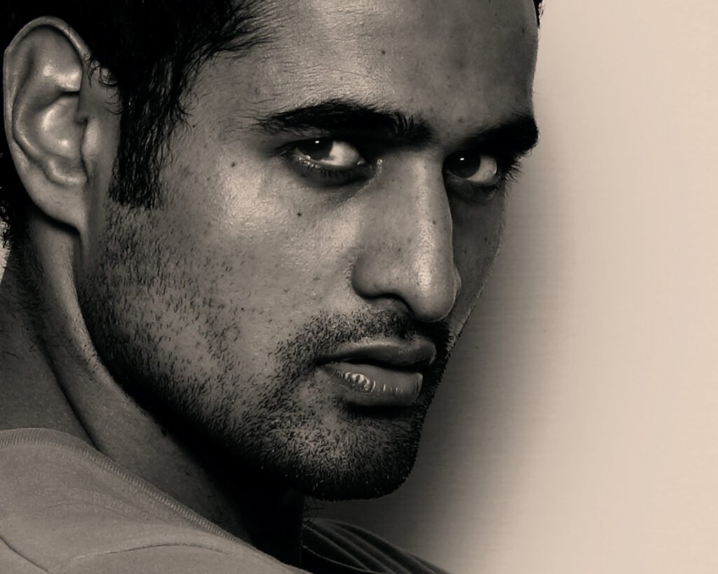 Intense close up portrait of Australian actor and director Nicholas Brown during a dramatic studio photoshoot by Auckland photographer Jassa Studio